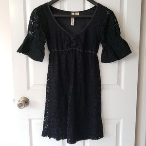 Black lace-patterned baby doll style dress